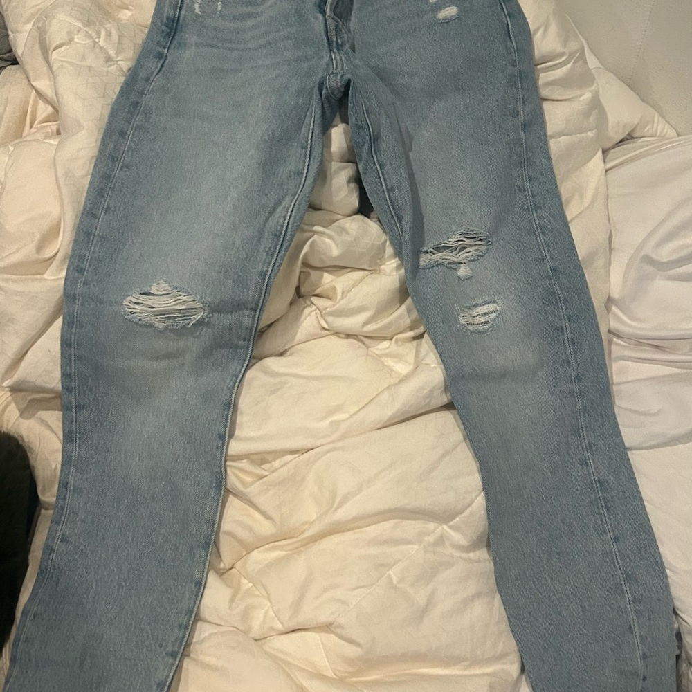 Women's Distressed Blue Jeans